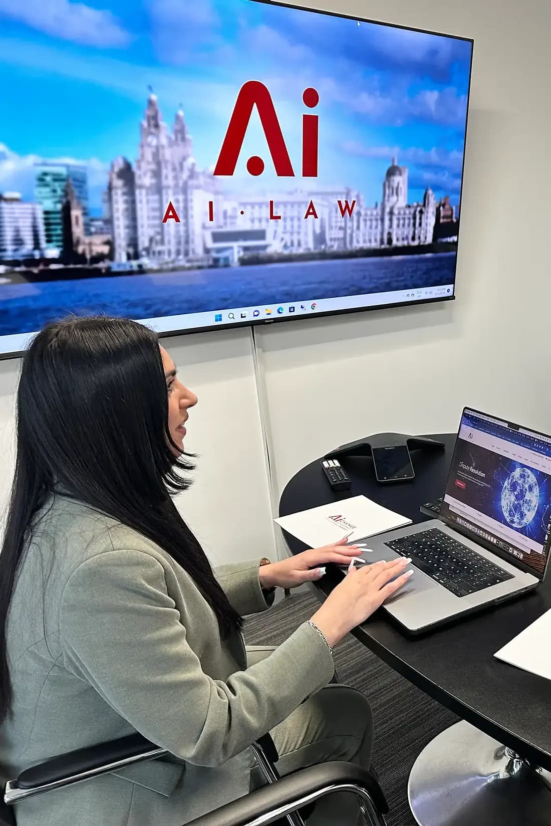 A member of the Ai Law team at work in the office's meeting room